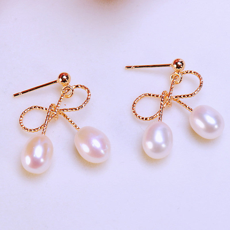 Temperamental Minority Zhuji Freshwater Pearl Earrings Ins Style Bow Pearl Auricular Needle Goddess Style One Piece Dropshipping Pearl earrings