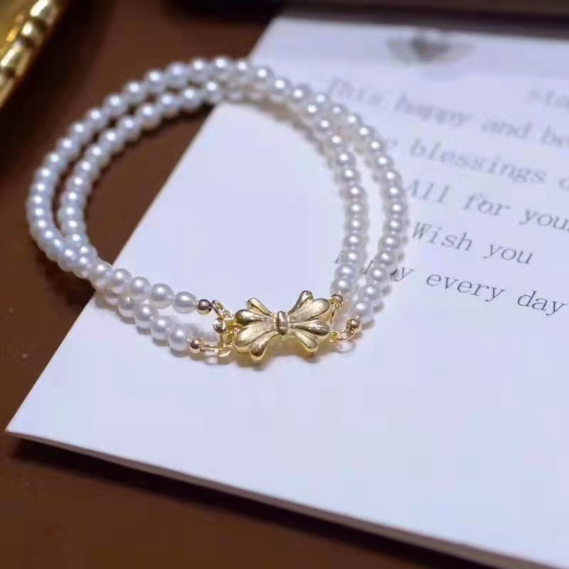 Factory Direct Supply Fresh Water White Pearl Double Layer Bracelet Retro Style Bow Buckle Handicrafts Crafts Wholesale pearl bracelet